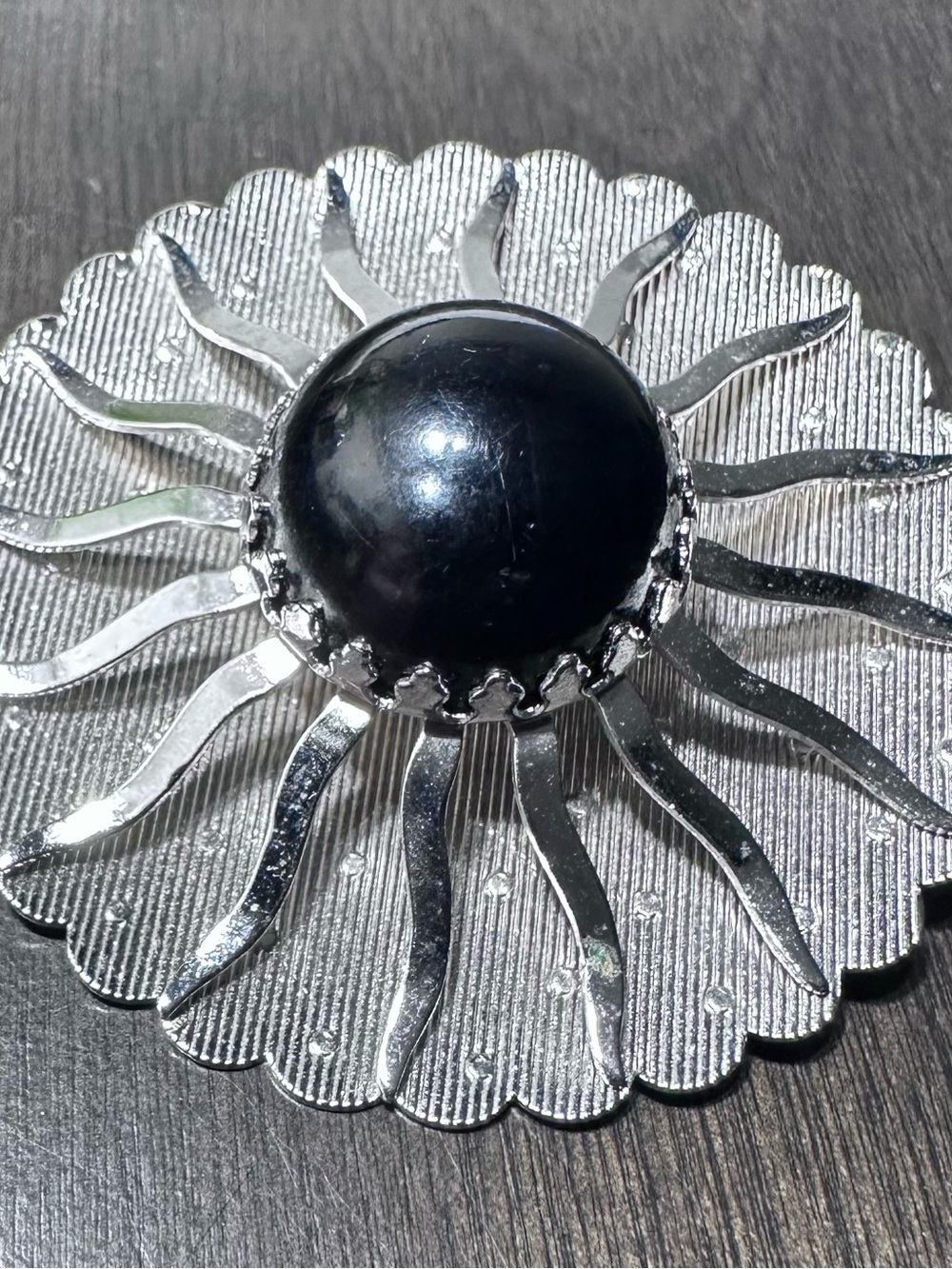 338- Sarah Coventry Vtge. Silver Sunburst Brooch with Black Cabochon